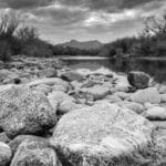 Black and white photo of boulders in the Salt River, Arizona